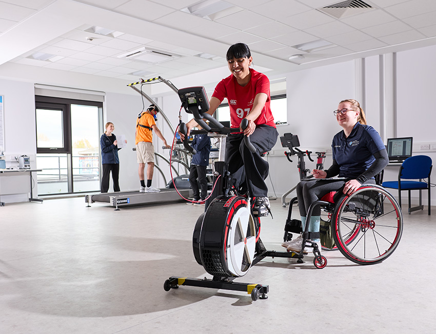 Students using sports lab equipment