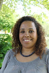 University of Worcester logo on a light blue background