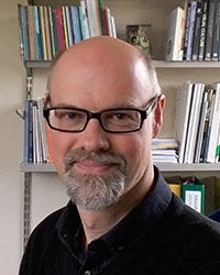 University of Worcester logo on a light blue background