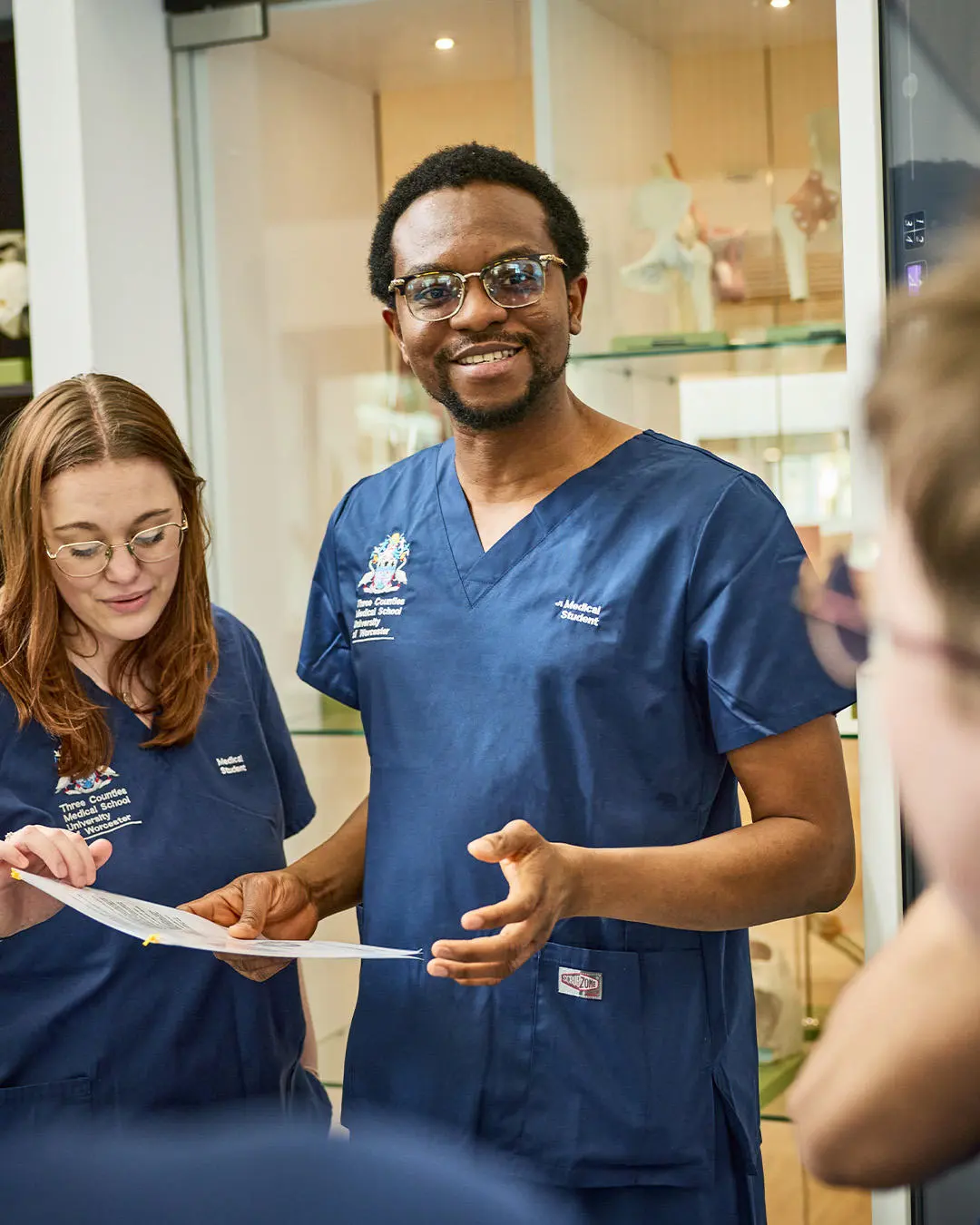 Medical students working on a simulated case study together