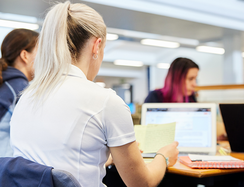Student working on a laptop