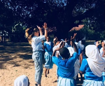 University of Worcester logo on a light blue background