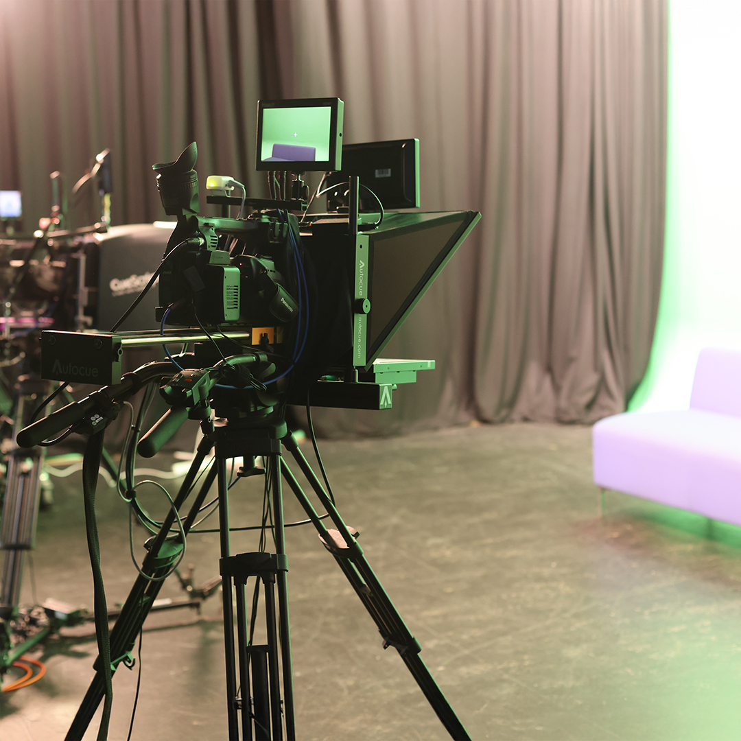 A camera filming a sofa