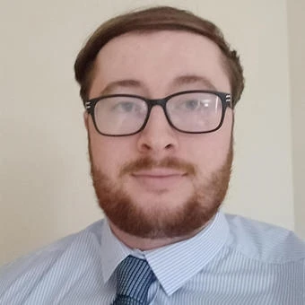 University of Worcester logo on a light blue background