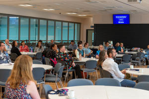 Attendees of the PGR conference, listening to a speaker