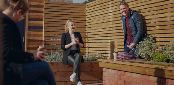 students chatting in the students union garden