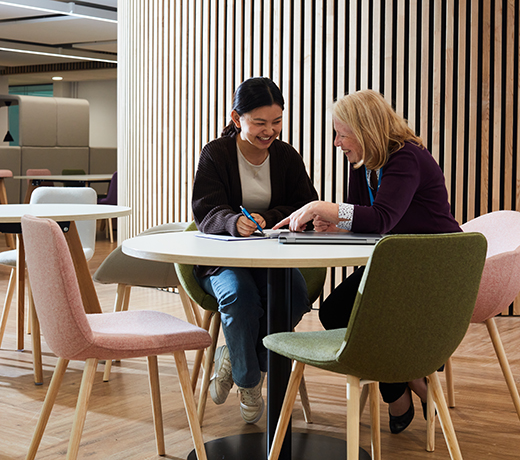 A lecturer and student having a conversation