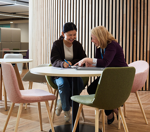 A student and lecturer having a conversation