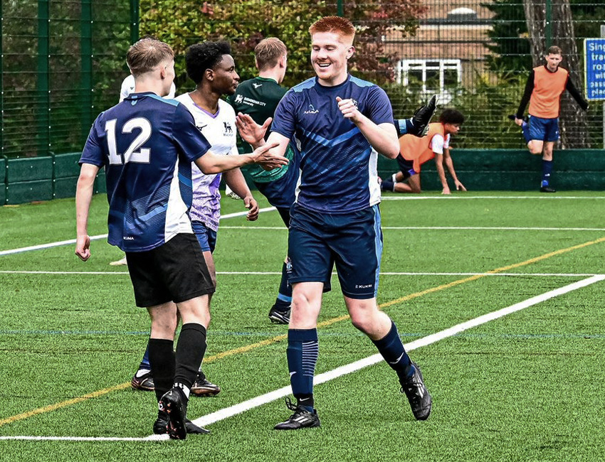 Football players celebrating after a match