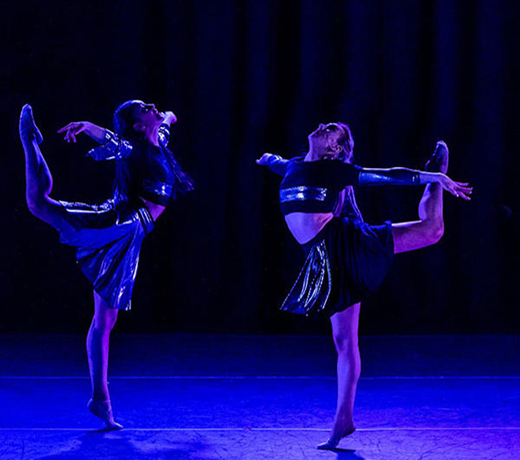 Two students dancing onstage