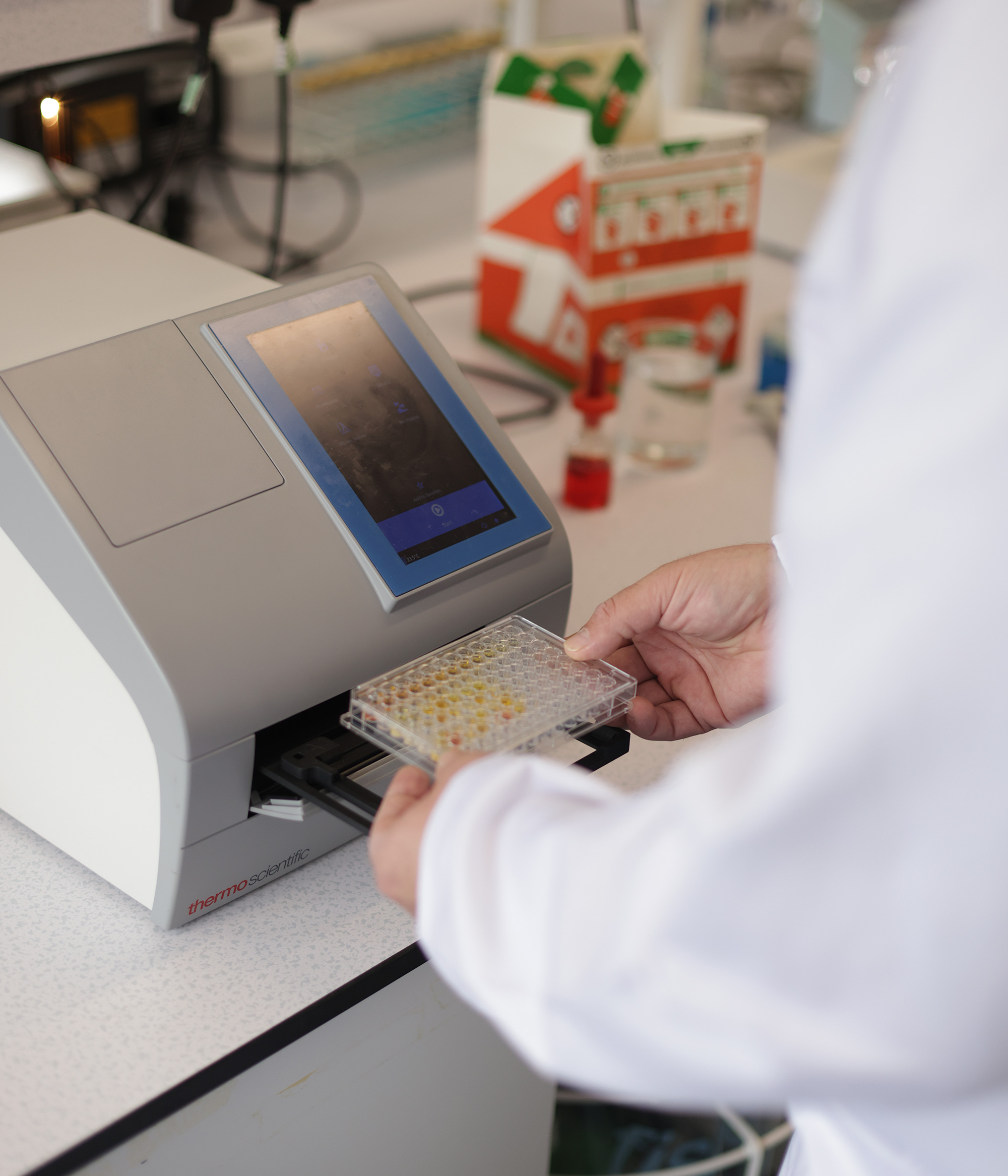 A student using equipment in the labs