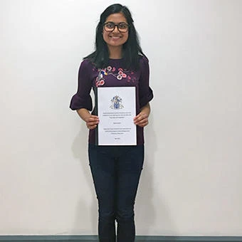 University of Worcester logo on a light blue background