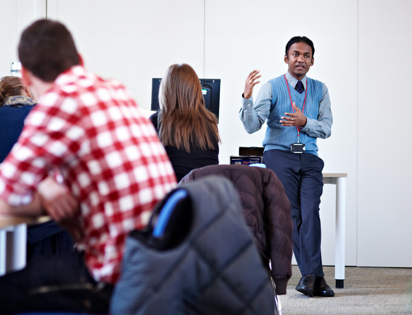 A Business lecturer presenting to students