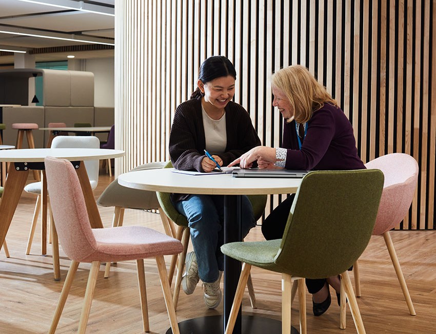 A student and a lecturer having a sit down conversation