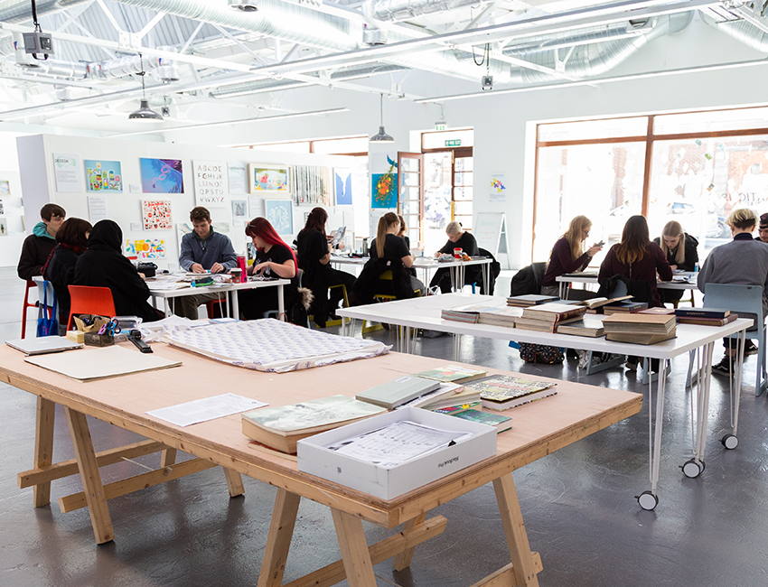 Students drawing in the Art House