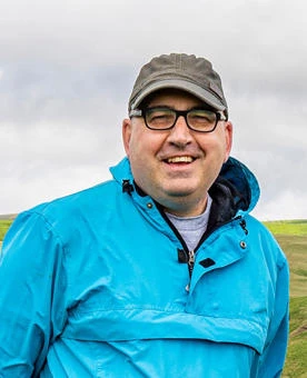 University of Worcester logo on a light blue background