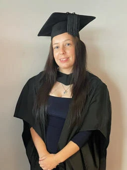 University of Worcester logo on a light blue background