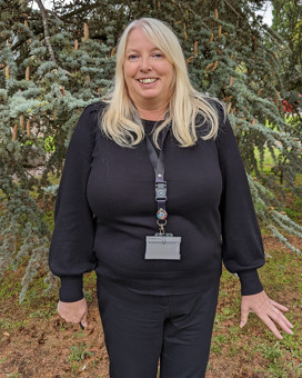 University of Worcester logo on a light blue background