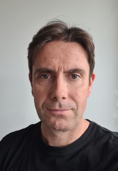 University of Worcester logo on a light blue background