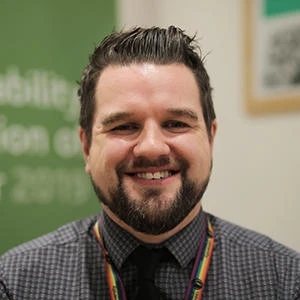 University of Worcester logo on a light blue background