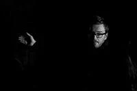 University of Worcester logo on a light blue background