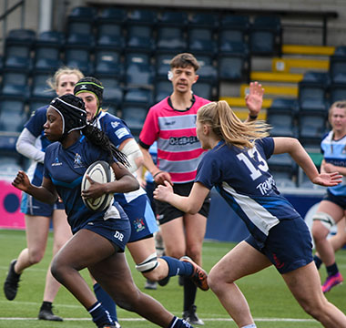 Women playing rugby