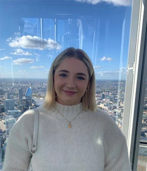 University of Worcester logo on a light blue background