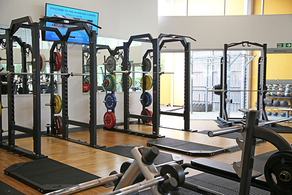 Some racked weights in the gym