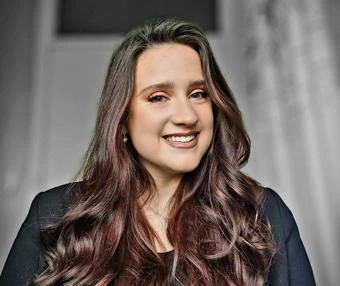 University of Worcester logo on a light blue background